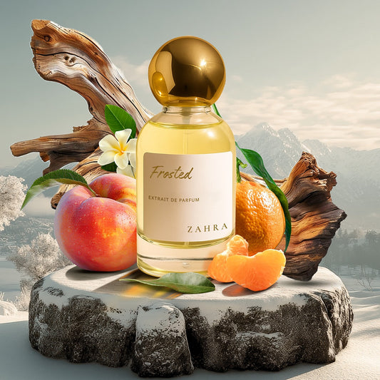 inspired by Parfums de Marly Valaya Perfume bottle labeled 'Zahra' with fruits and leaves on a natural stone surface